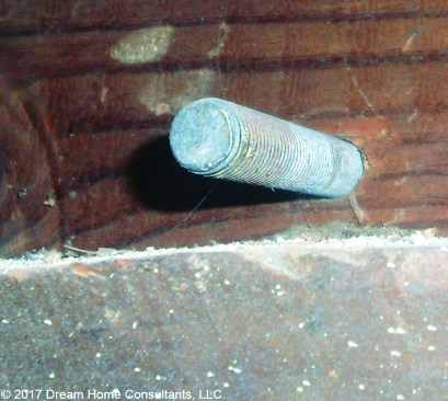 ... but it’s better than forgetting the nut and washer. Also note that this bolt is too close to the edge of the rim joist and could cause it to split.