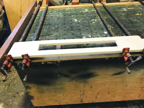 The author cut the stiles and rails to size from 3/4-inch-thick PVC stock and set up his gluing station. He then used fast-cure PVC cement to glue up the frames one at a time.