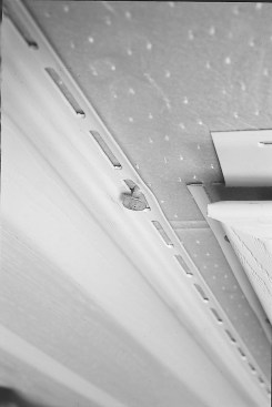 Do not drive nails home when installing vinyl siding. Vinyl siding needs to be able to slide back and forth as it expands and contracts with changes in temperature.