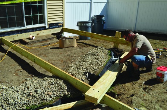 PT lumber rated for ground contact was used for the triple 2x8 carrying beam.
