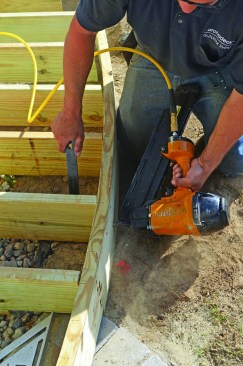 Then, they nailed it to the joist ends before finally fastening the joists to the carrying beam.