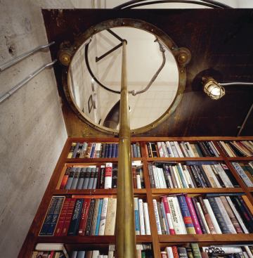 And there's always the benefit of on-the-fly access to the uppermost bookshelves on the way down.