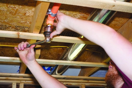 The head is again tightened with a wrench ...