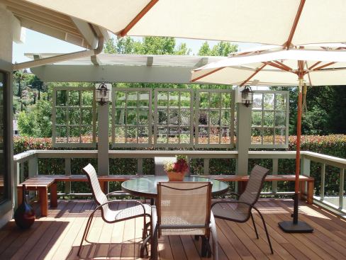 Claudia Schmutzler of Windsor Decks & Gardens custom builds and glazes the windows that she uses on her decks. Depending on where the windows are located, she may use tempered glass as required by code.                              