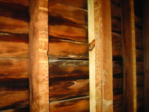 In historic New Orleans, there are many buildings where the old board siding cannot be removed.