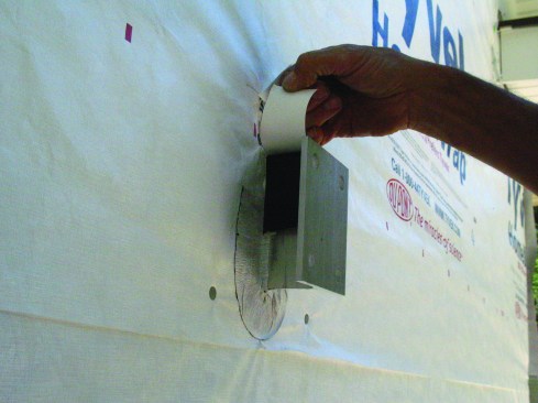 The brackets can be waterproofed with flexible flashing tape bonded to the web and the housewrap covering the foam panels. Apply the tape shingle-style, so that the top piece overlaps the bottom piece, as shown.
