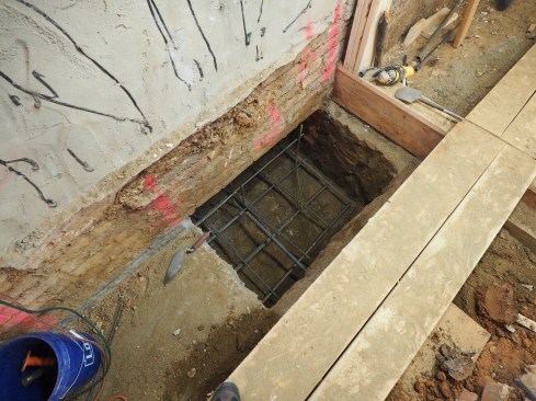 Each section of the underpinning is both footing and foundation. 