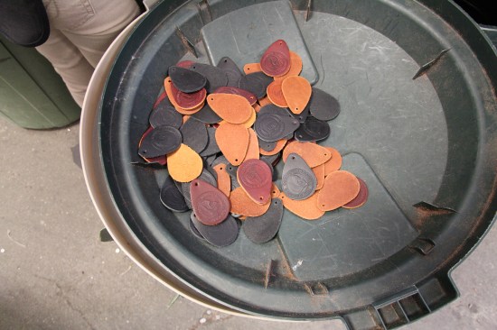 Leather tags after they have been embossed with the musk ox that is the company logo. More on the musk ox later.