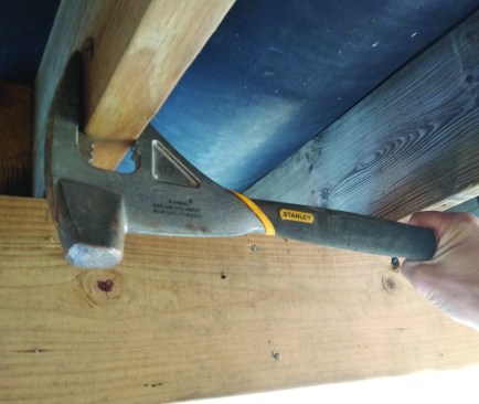 The jaws of the Mayhew Tweaker (top) and the Stanley FuBar (bottom) are designed to grip the edge of 2-by framing so that twisted joists can be easily leveraged into position with one hand.