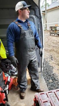 The bib-style rain pants have a stretchy fit and an adjustable waist.