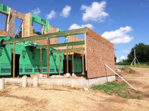 Three treated glulam beams provide the main structural support for the deck.