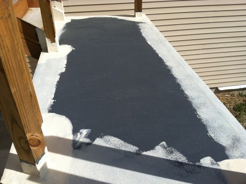After the final coat of waterproofing cured, the author began applying the first of two coats of Safe-TDeck top coating.