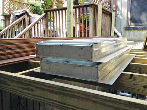 Structural glass-block skylights are heavy, so the author ordered two smaller units instead of one large one to make handling easier.