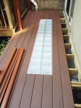 The skylight has a non-skid finish and is flush with the decking.