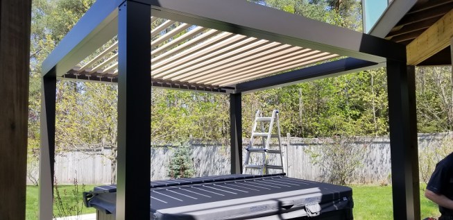 Louvered Roofs; Arcadia Louvered Roofs (www.arcadiaroofs.com) are becoming very popular. There are other manufacturers but this is simply the most robust system we have found. We used 3 canopies on this deck, one over each room on the deck and one over the hot tub. The best part of Arcadias is that it creates a dry space on the deck and the shade drops the temperature about 15 degrees on sunny days. Heaters and Ceiling fans can also be mounted within the roofs. Being aluminum, you don't have to worry about heaters causing damage.