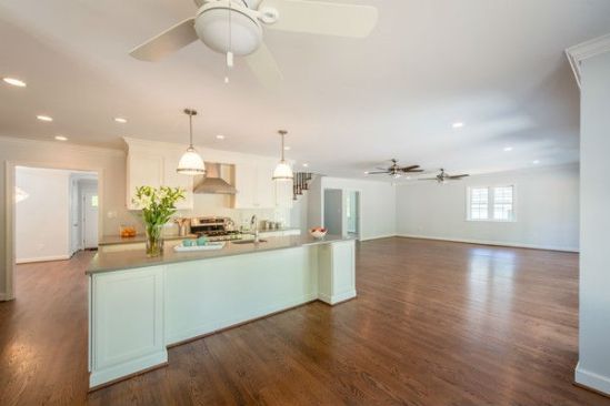 The redone first floor of the home now has an open floor plan that allows for a more functional space in the kitchen to accommodate eating and gathering as a family.