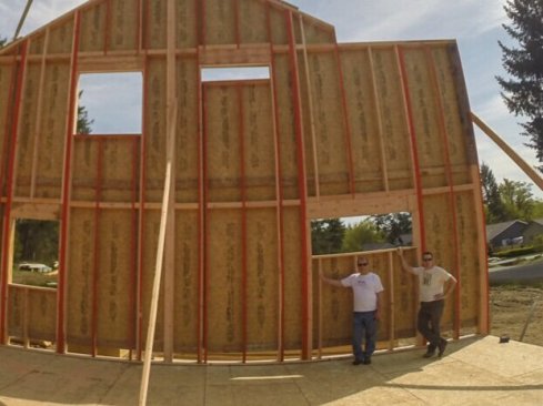 The same wall as in the previous photo. The upper row of blocking needs to be strapped to the double top plates of the level portion of the wall.