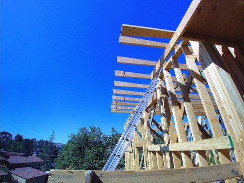 At the fascia, a steeper slope back toward the wall maintains a straight, level sight line.