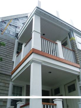 The classic railing design suits the traditional appearance of this New England home.