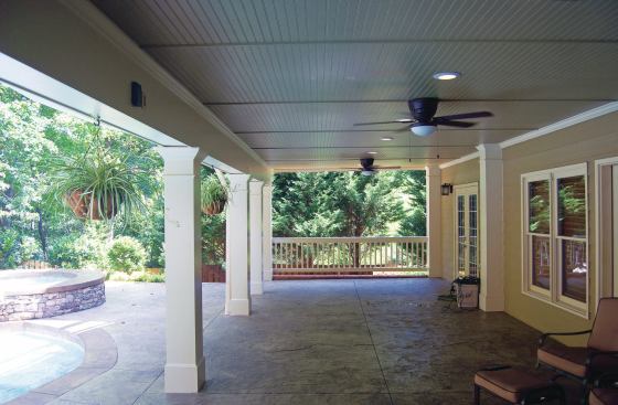 This concrete patio was stamped with a large random pattern. The expansion joints contribute to the illusion that the patio is made up of large slabs of slate.