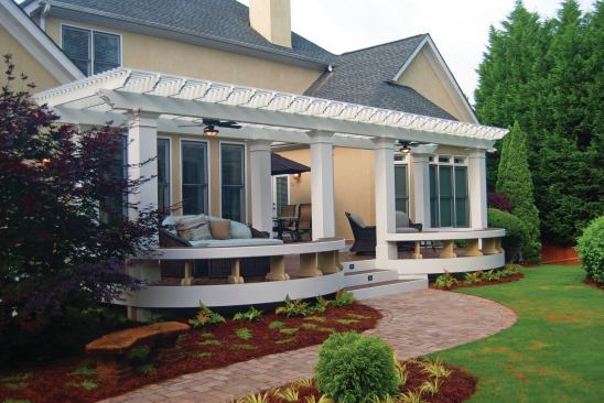 A walkway built with natural stone or concrete pavers can be used to complement most styles of porches and decks.