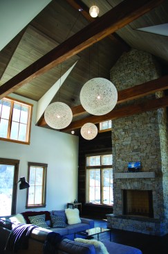 LED lights can provide beautiful and functional illumination in a full range of color temperatures and intensities, to support any aspect of life in a home. The LED chandeliers and pendants Tim Mathieson used in the vaulted living space above mix well with daylight.
