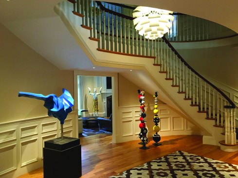 Small, discreet recessed fixtures were aimed at featured artworks.