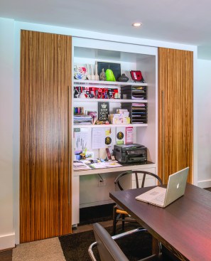 Anthony Wilder Design/Build created this office with two sliding doors to allow the space to transform instantly from office to formal dining room.