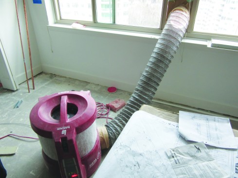 At the top end are air filter systems that come equipped with HEPA filtration. The author recommends the filter systems for situations where blowing dust out of the window would create a nuisance for neighbors.