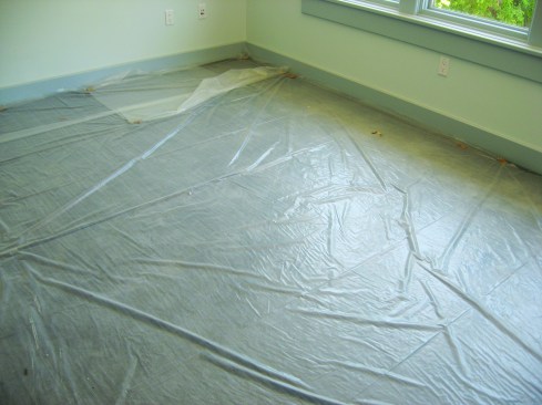 Whole rooms can be protected with a sheet of 2-mil or thicker poly.