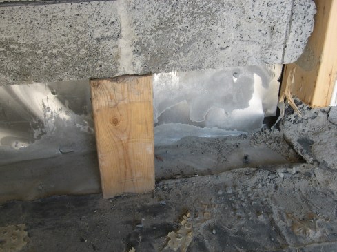 The wall was supported with pieces of 2x4.