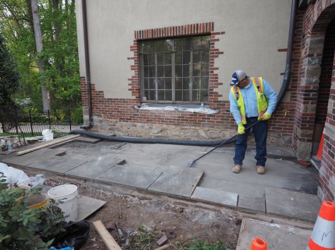 Finally, new pavers are set into a fresh mortar bed/
