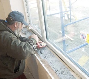 Condensation on a very cold day during construction indicated gaps around this window that were not revealed during blowerdoor testing. The author stripped back the drywall returns and caulked around the jambs.