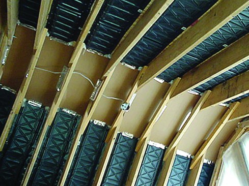 2. Vented cavity. An inexpensive option shown above is to vent a cathedralized
space using continuous vent chutes spanning the entire length from soffit inlets to ridge outlet.