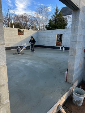Finishing the poured slab