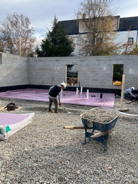 Beneath the basement slab of the Queen of Zero project, the crew installed two inches of R-10 Foamular NGX rigid XPS insulation over 4-inches of crushed gravel that serves as a capillary break.
