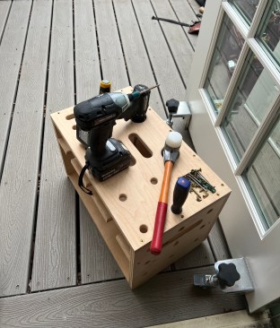 Brian outfits the Katz Box with the tools he needs for a range of different jobs. Here, he has outfitted it with just what he needed to hang a door, and then used the box as both work center and step stool to complete the task. 