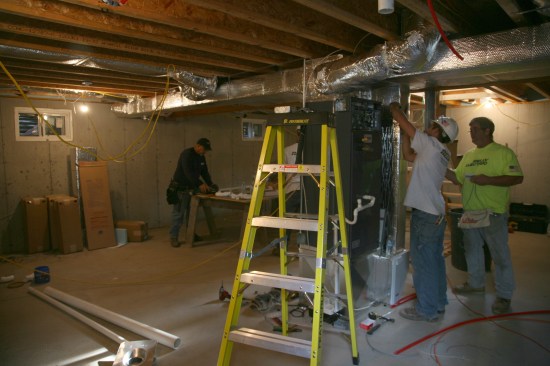 4:05p The HVAC system, rough electric and rough plumbing continues at a fever pitch.