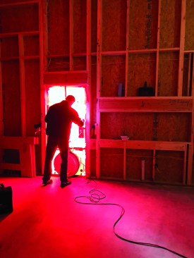 Blower-door testing before insulation allows the crew to easily identify leaks in the shell before they get buried.