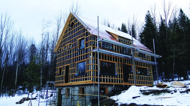 The homeowners chose a rainscreen siding system requiring a drainage-plane membrane and cross-strapping, which resulted in a significant increase in cost compared with the next-lower-performing option.
