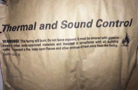 The warning label on paper-faced insulation batts clearly states: “This facing will burn ...” It cannot be left exposed but must be covered with drywall or other type of sheathing permitted by code. This applies in concealed framing cavities, in knee-wall areas (even if the knee-wall area is inaccessible), in attics and in crawlspaces. (photo: Glenn Mathewson)