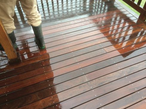 When ipe has weathered unevenly, pressure-wash it with a mild cleaner prior to refinishing to remove graying and give the surface a more uniform appearance.