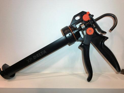The Irion XP-Delta caulking applicator has a switchable 25:1/12:1 trigger ratio for more power in cold conditions and more control in warm conditions and a comfortably grippy rubber-coated trigger and handle.
