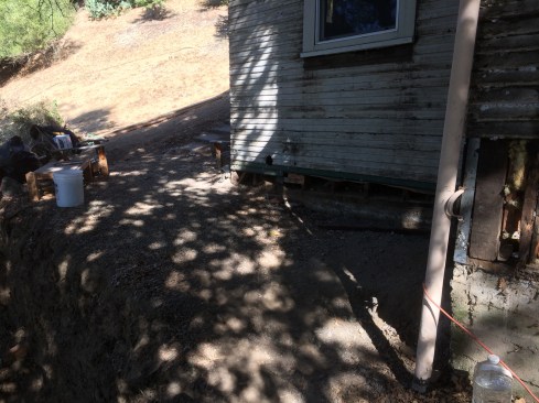 The existing home’s shallow foundation was lightly built in the 1920s, and the building’s floor system and cripple walls had been buried in accumulated soil and were damaged by dry rot.