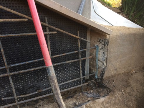The rebar grid was doweled into the existing garage structure.