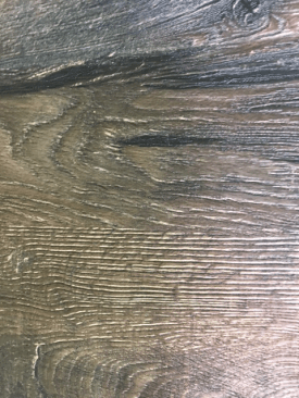 Wood? Laminate? LVT? Embossed-in-register technology from IVC makes it difficult to tell. Shown here: LVT (luxury vinyl tile)