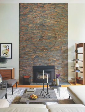 Shabby brick on the fireplace and hearth was replaced by porcelain tile that extended all the way to the ceiling.