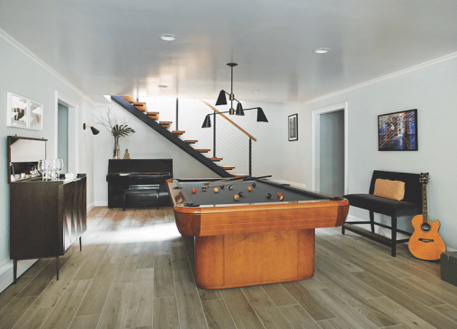 A complete gut of the lower-floor family room and bedrooms brought in more light and clean surfaces.