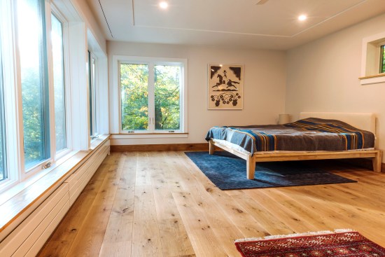 This completed bedroom (photo above) was part of the remodel of a two-story addition, done fixed price with hourly extras. Because of adverse weather (working outside through the winter) the author's company lost out because they had more labor involved than they had originally bid.