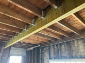 If the available hanger options don’t fit exactly, the author chooses one that’s wider than the joist, and packs it out with plywood running the full height of the joist.